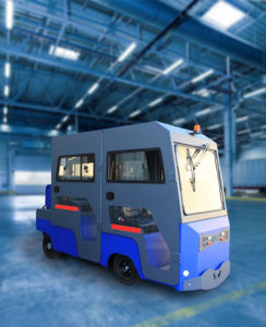 Véhicule utilitaire électrique bleu à cabine entièrement fermée avec vitres panoramiques, gyrophare et portes latérales.